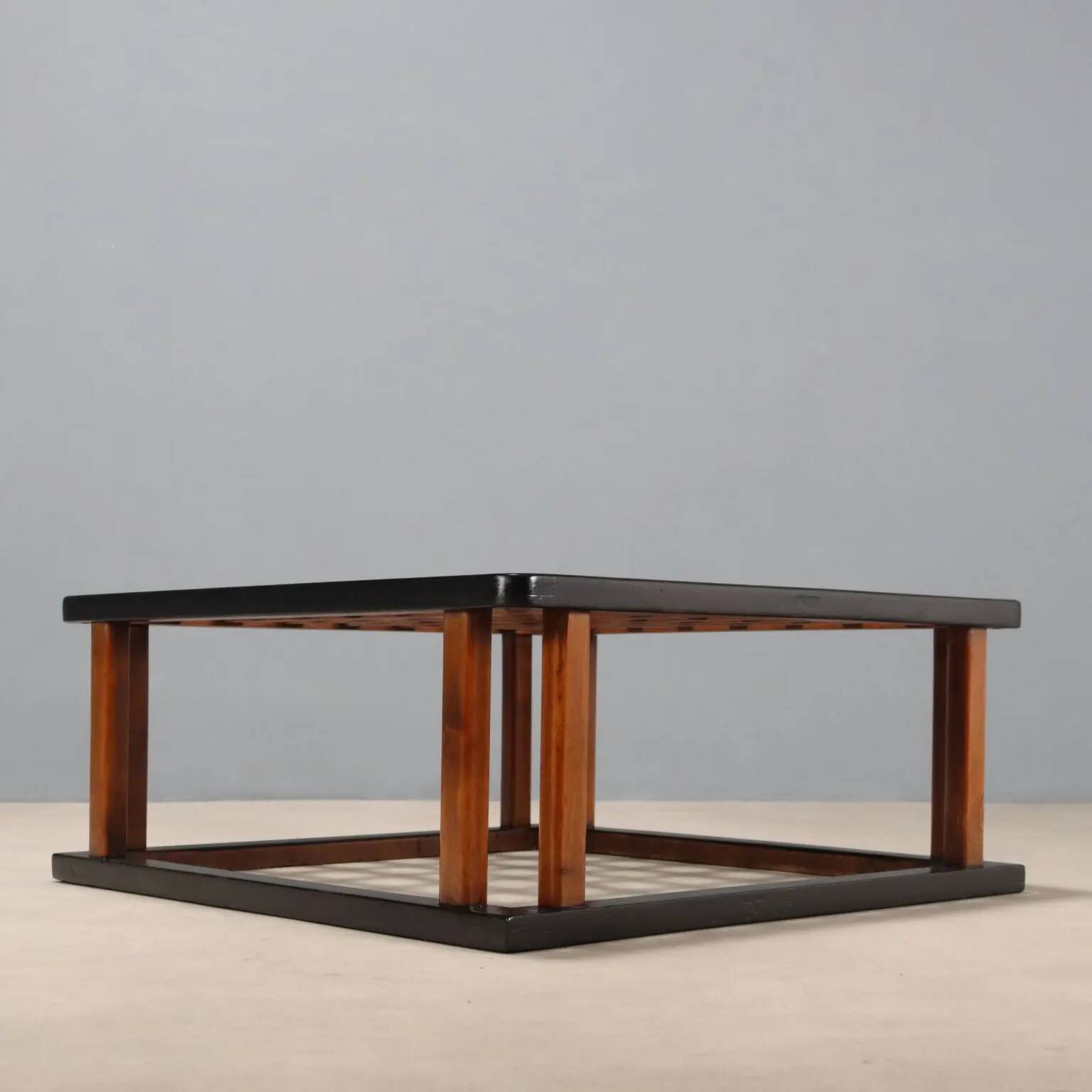 Vintage wooden coffee table with paint and glass, design from the 1940s-50s.