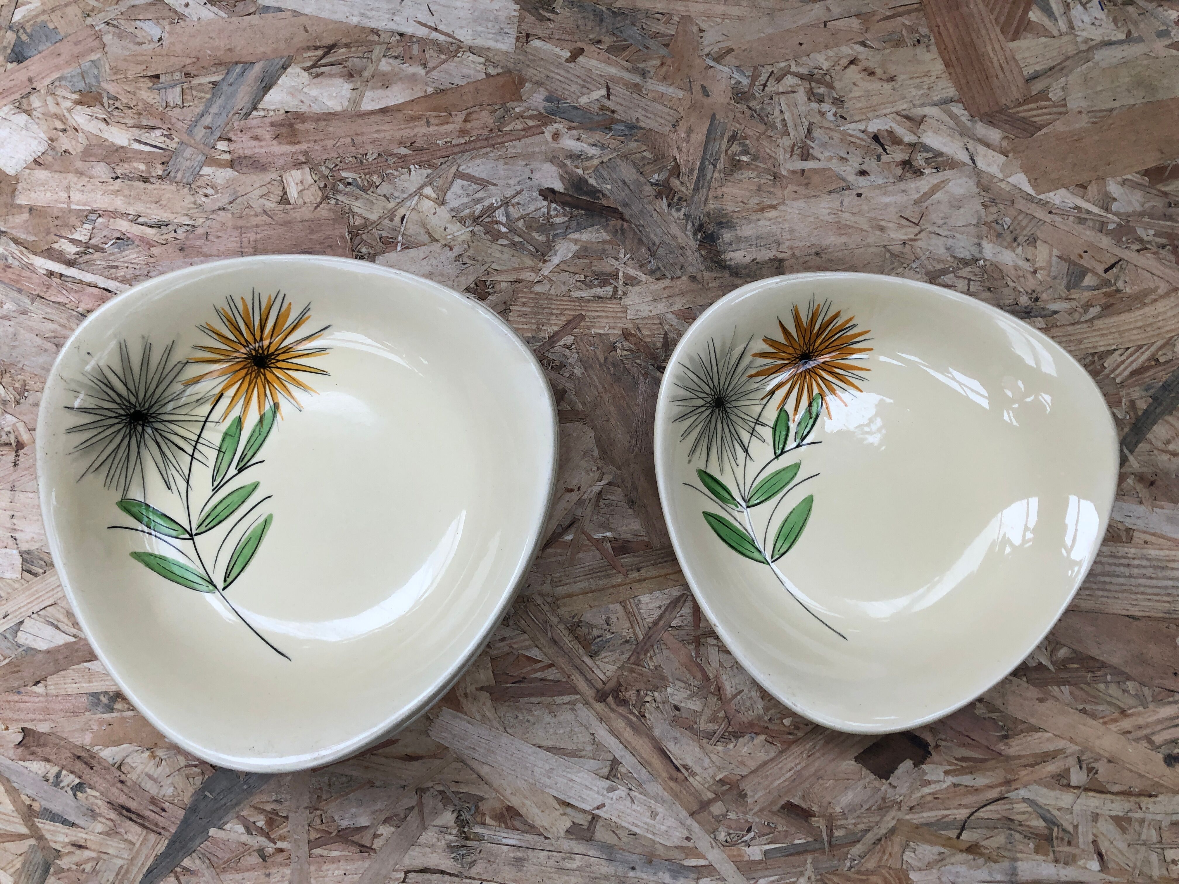 Set of 7 antique St. Clement Sirius pattern ceramic plates