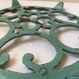 Dessous de plat en fonte vert doré