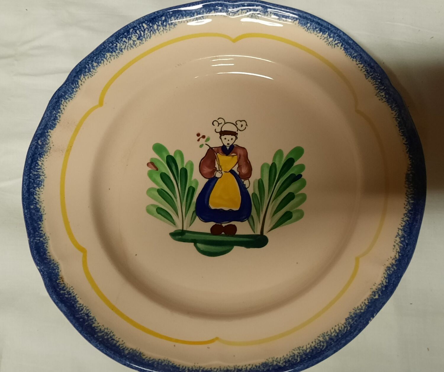 Old faience plate of pornic brittany breton woman and man décor