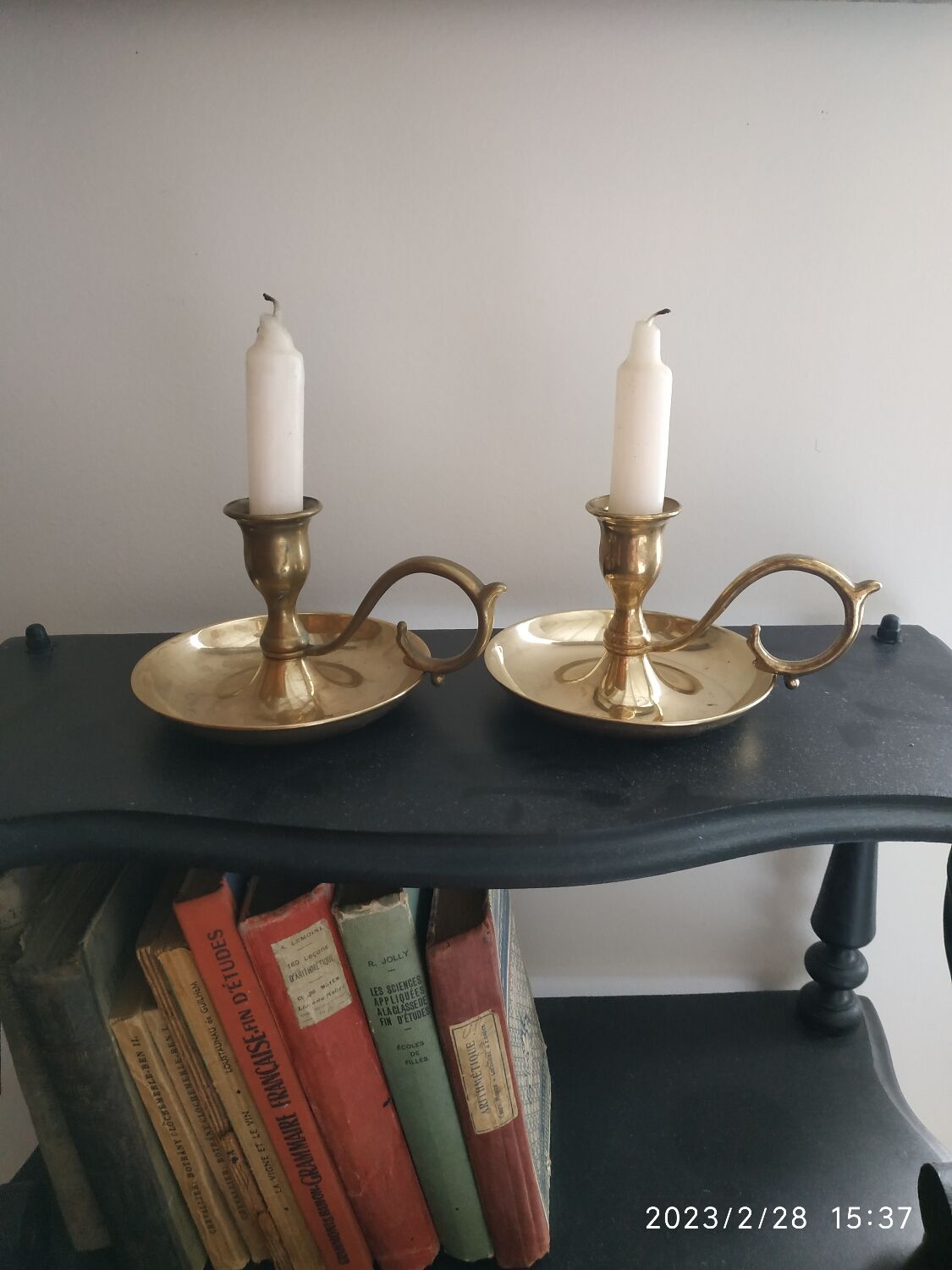 Duo of brass candle holders