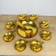 Cup and 8 Inalta France dessert cups in gold metal