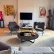 Pair of Joe PMP furniture armchairs in anthracite grey fabric.