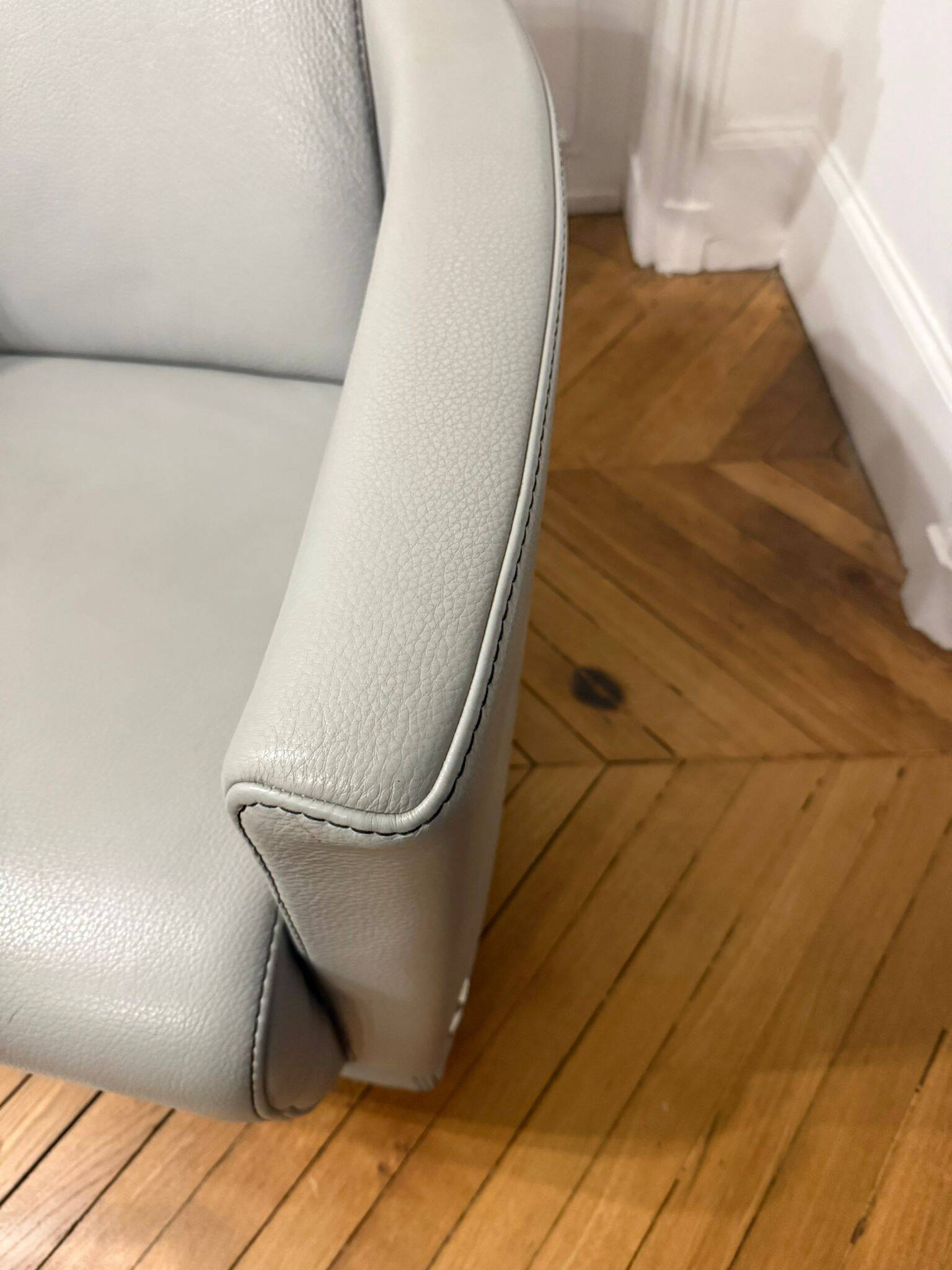 3-seater sofa, 2-seater sofa and an armchair in grey leather by Calia Italia.