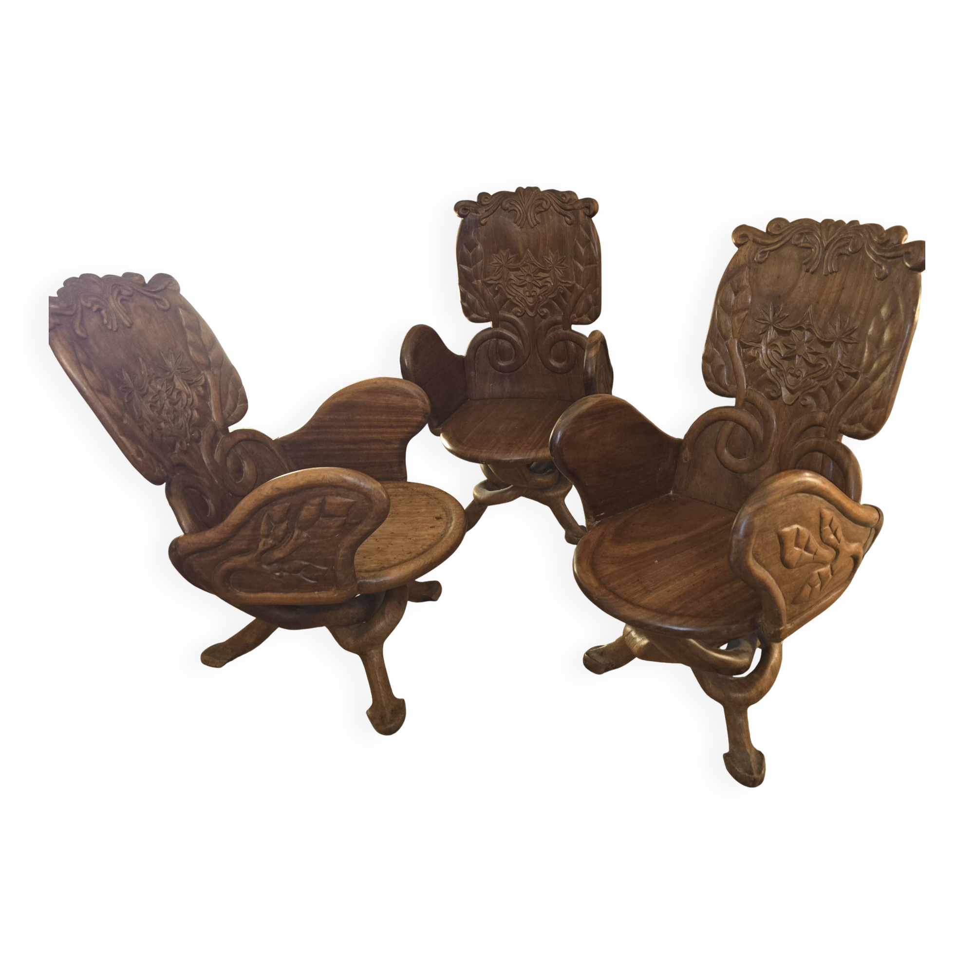 Solid wood chairs inspired by organic shapes sculpted by Gaudi.