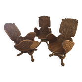 Solid wood chairs inspired by organic shapes sculpted by Gaudi.