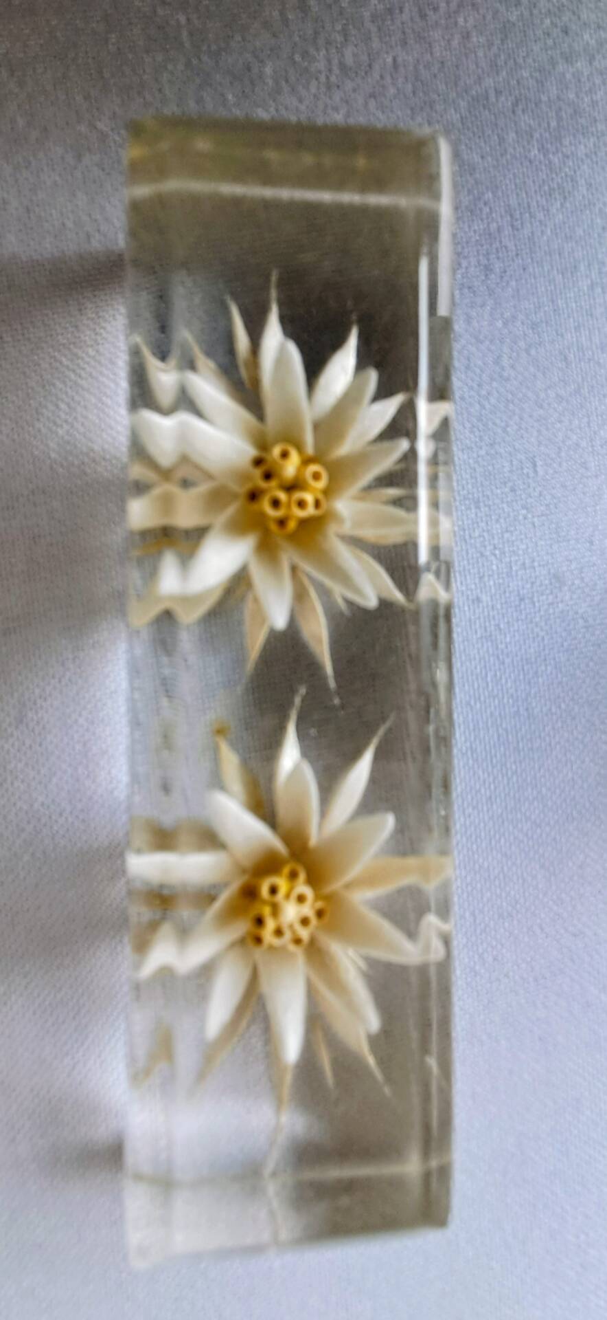 12 knife rests with resin inclusion. 1970s.