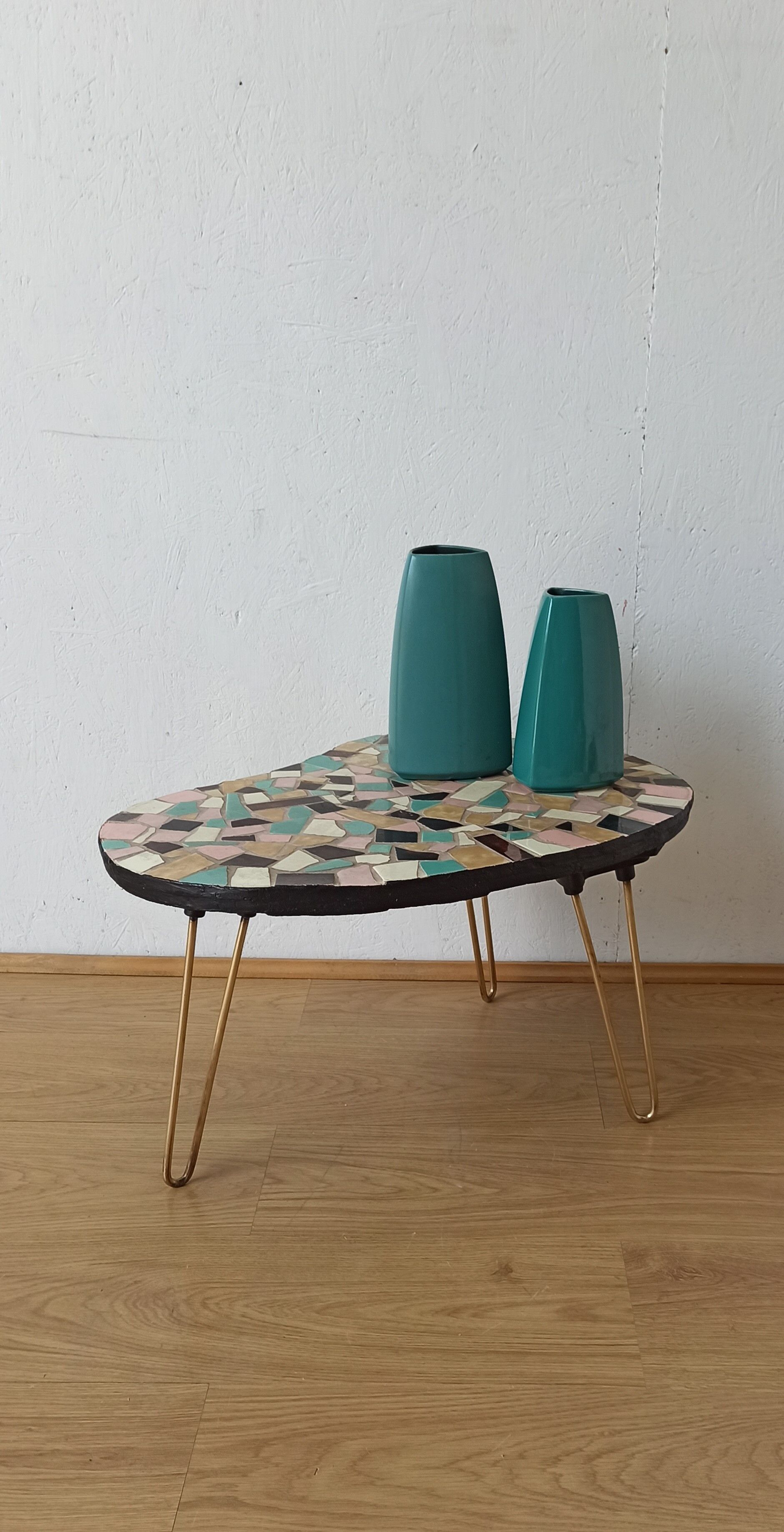 Unusual coffee table on three legs