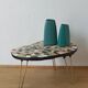 Unusual coffee table on three legs