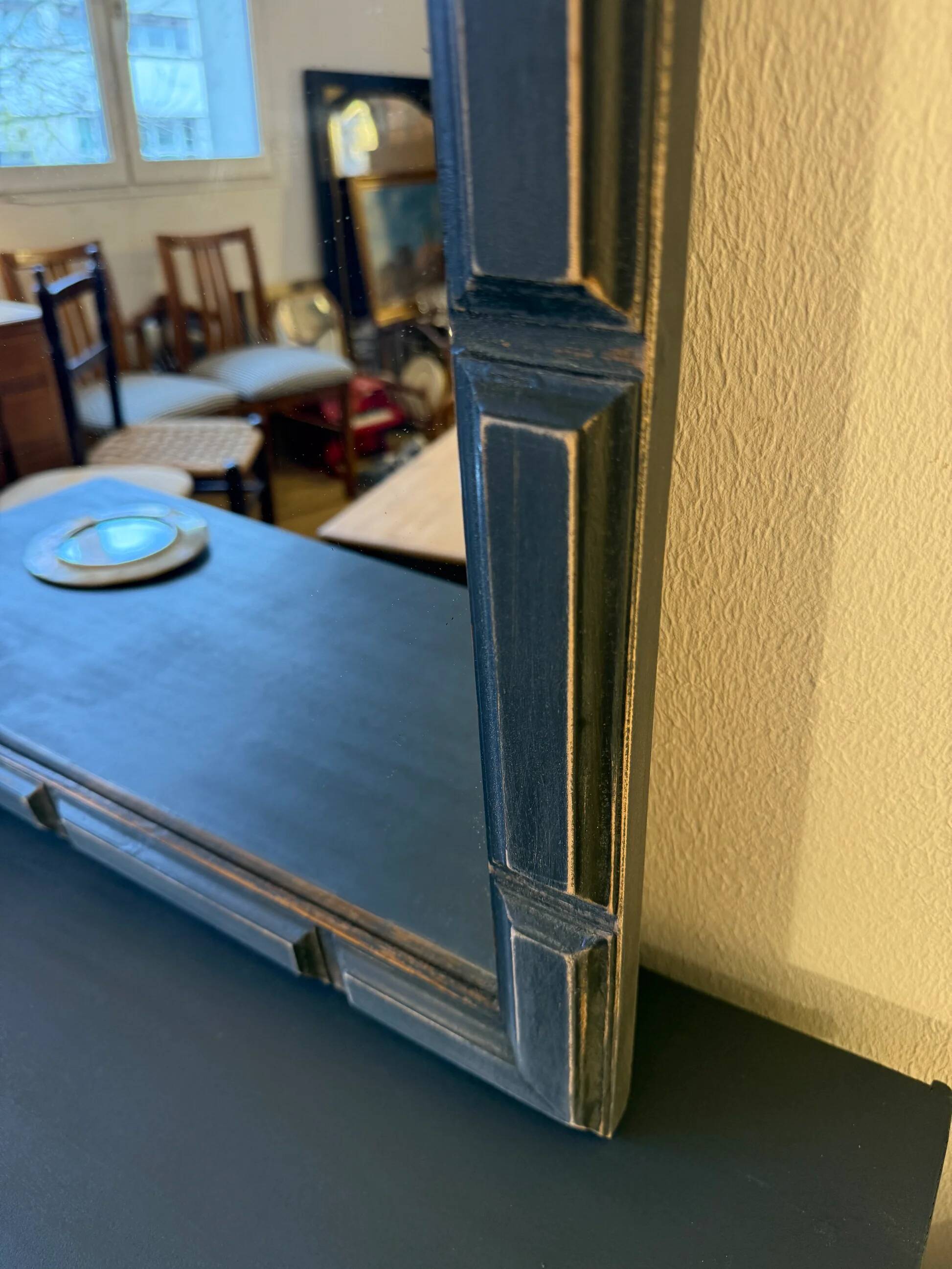 Patinated black rectangular wooden mirror
