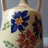 Polychrome earthenware vase decorated with flowers