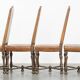 Set of 4 antique wooden and sheepskin leather dining chairs