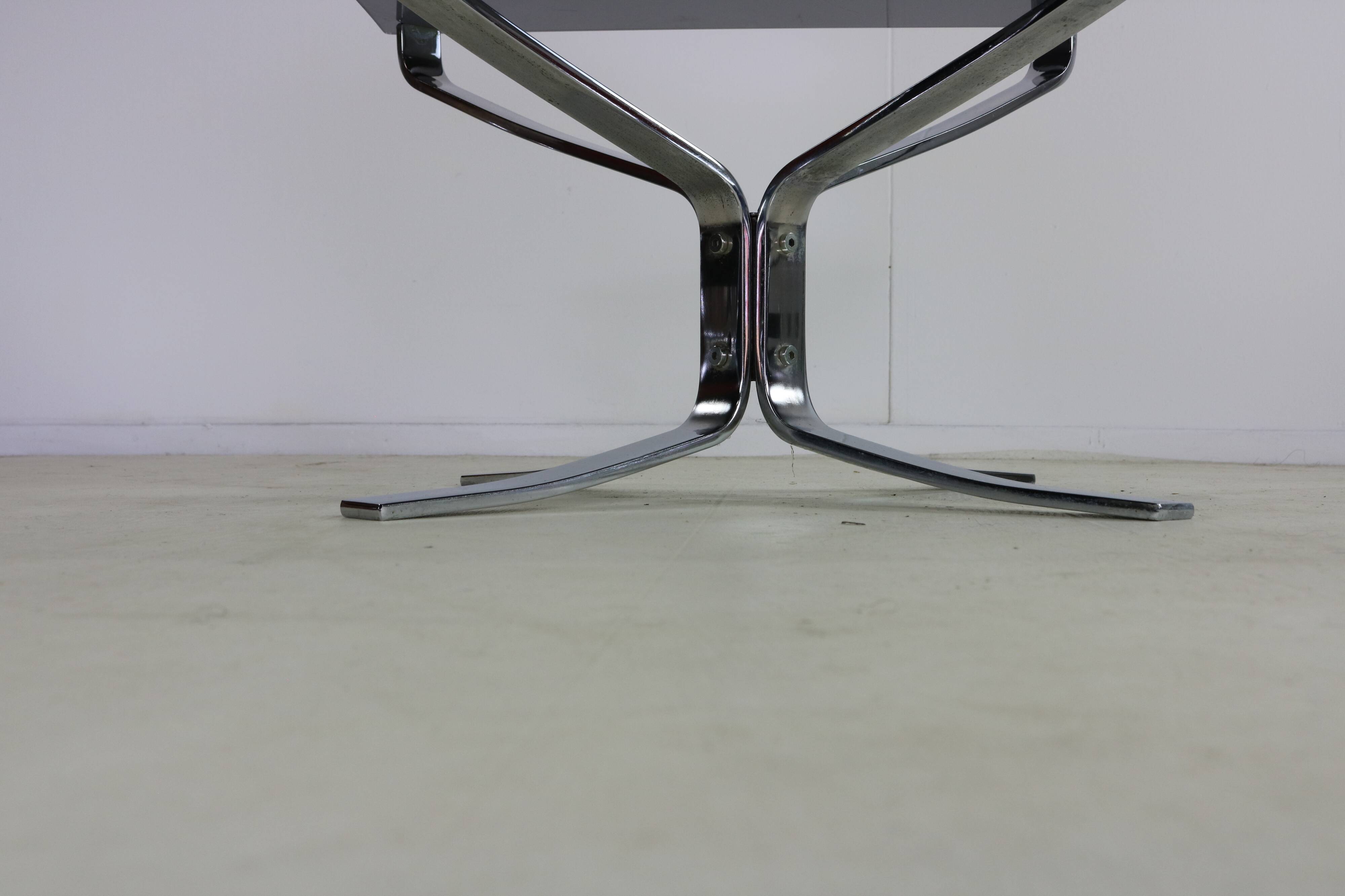 Seventies design special chromed metal Falcon chairs and table by Sigurd Re