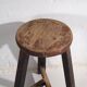 Antique round dark colored stool (c.1900)