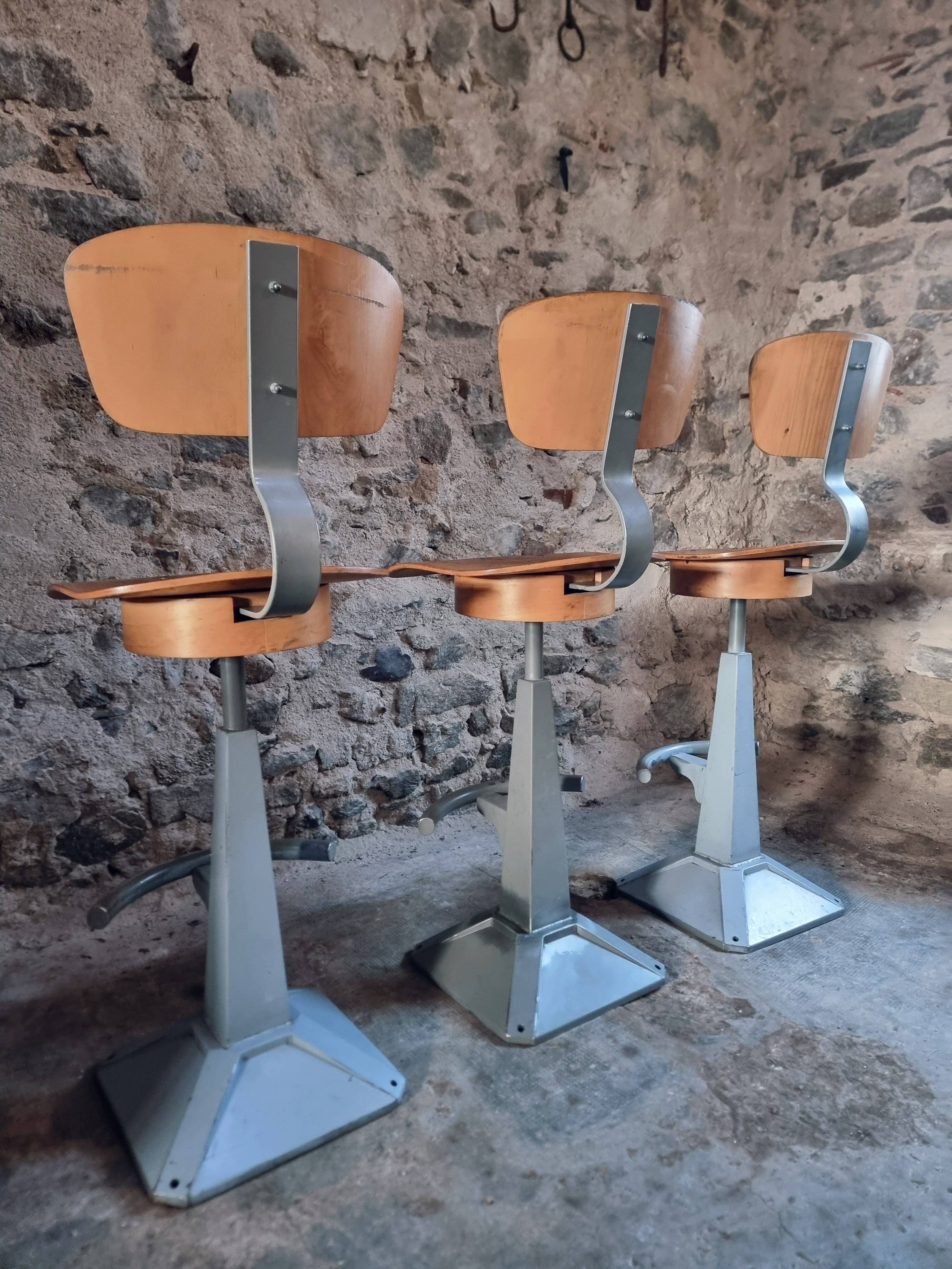 Set of 3 industrial swivel workshop chairs – fixed height bar stools – mid-century factory seats