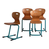 Vintage turquoise blue school chairs (c.1950). Set of 4 pieces
