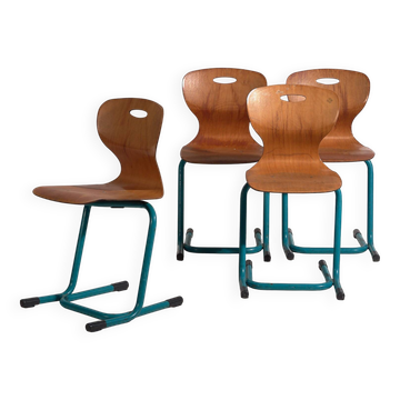 Vintage turquoise blue school chairs (c.1950). Set of 4 pieces.