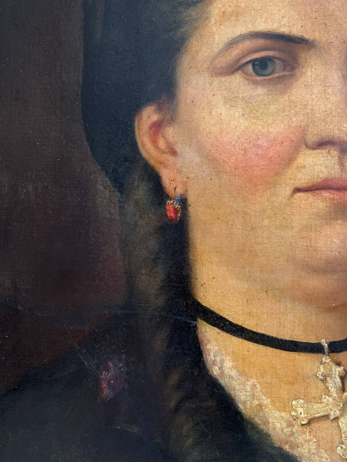 Old oil painting on canvas portrait of a woman with a red bow, late 19th century