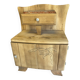 Raw wood bedside table