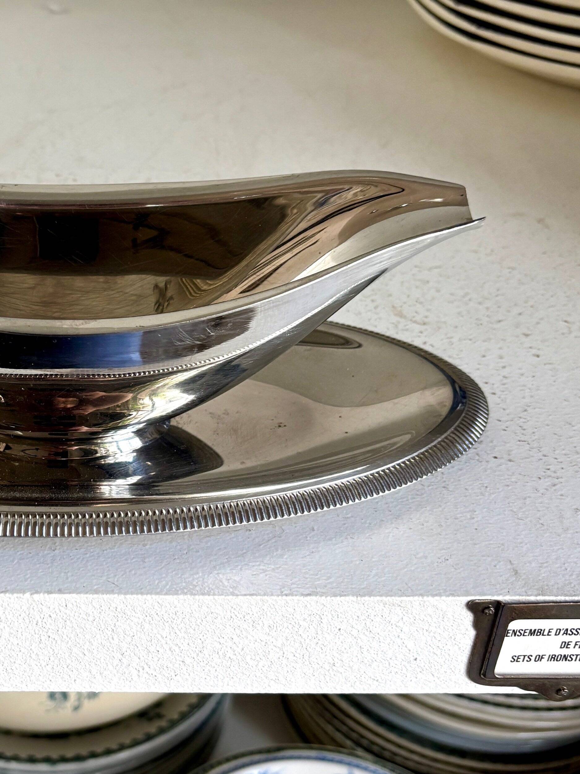 Silver stainless steel gravy boat