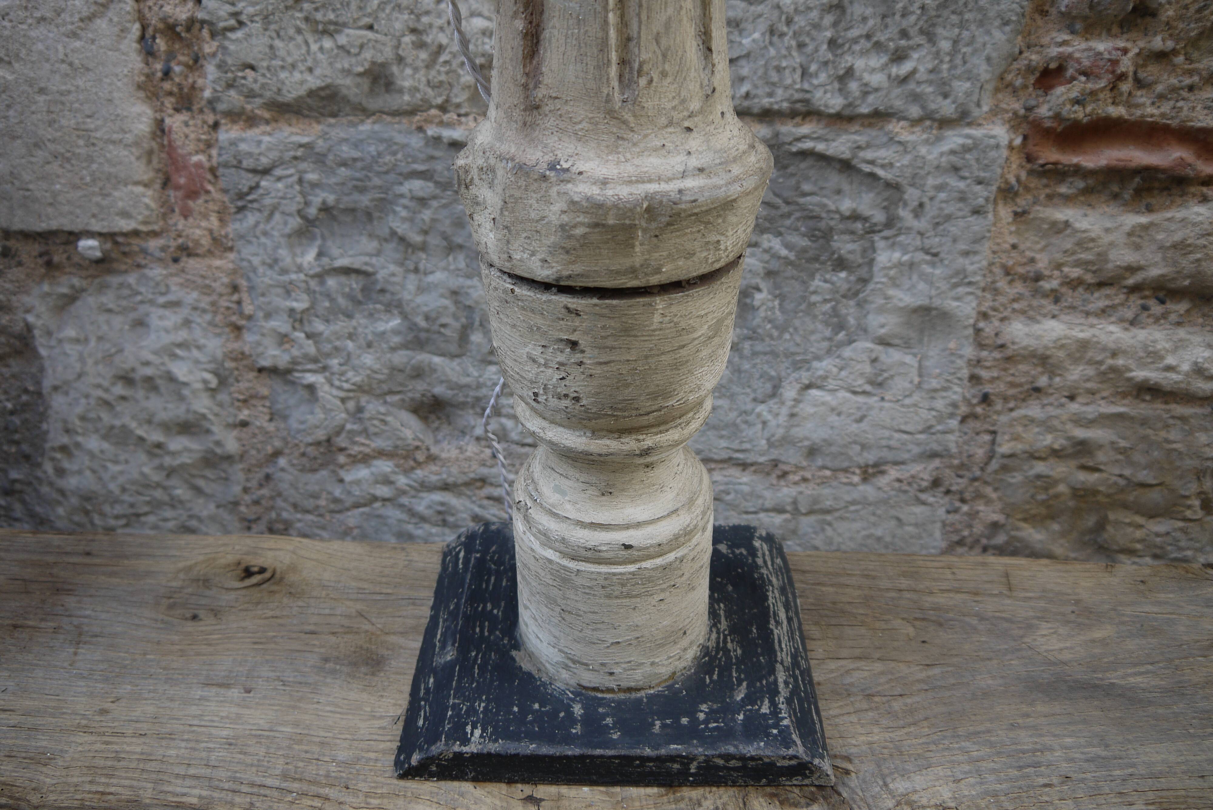 Baluster lamp foot in patinated wood