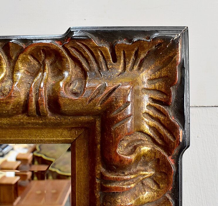 Gold-tinted wooden and stucco rectangular mirror - 1920