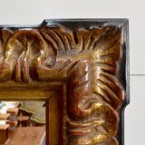 Gold-tinted wooden and stucco rectangular mirror - 1920