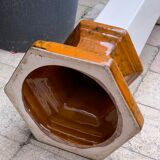 Column wears vintage plant