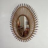 Rattan mirror in the shape of an eye