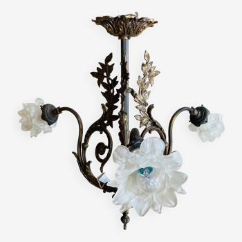 Pair of gilded bronze chandeliers decorated with foliage and acanthus leaves, early 20th century