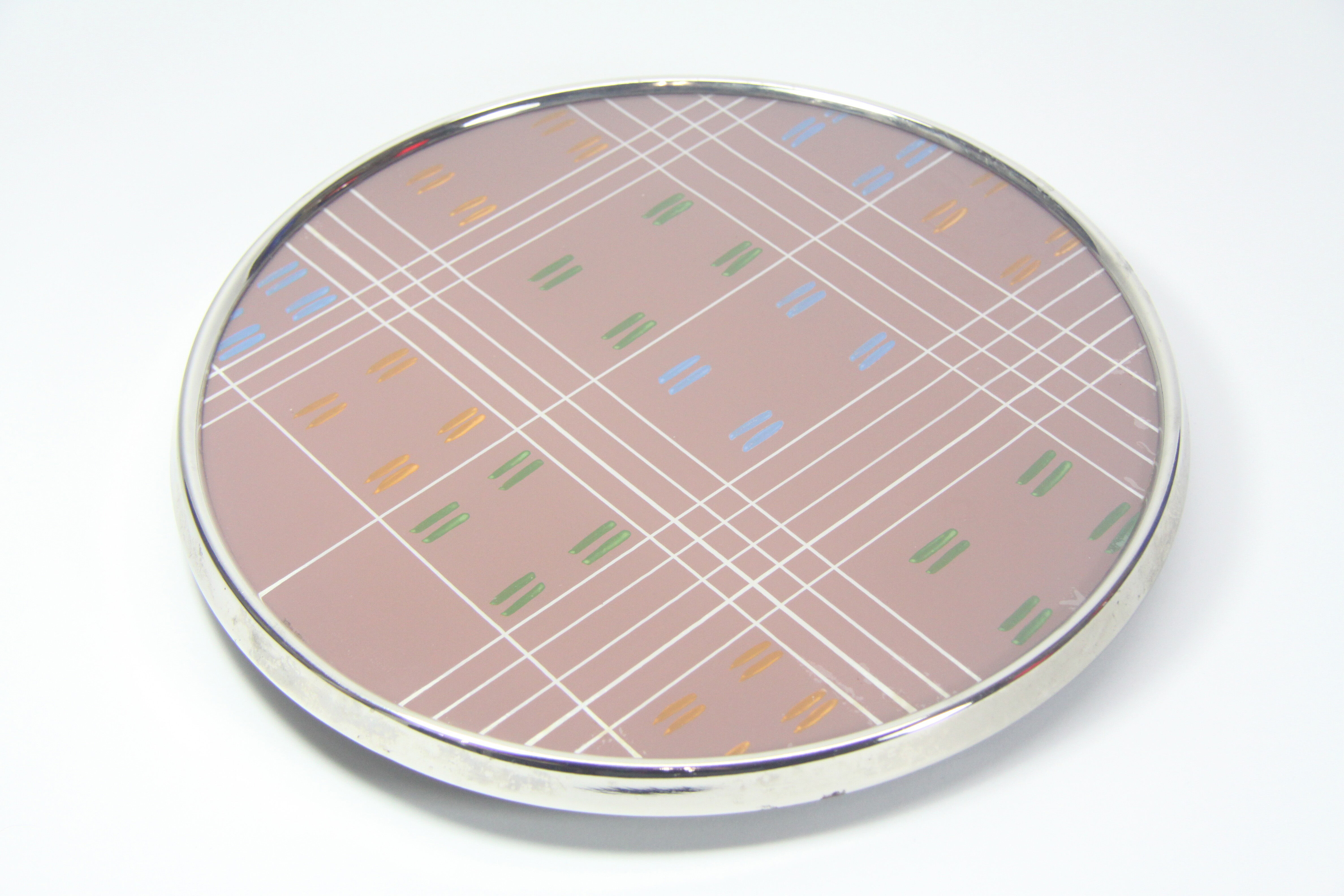 Rotary tray with painted glass