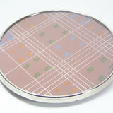 Rotary tray with painted glass
