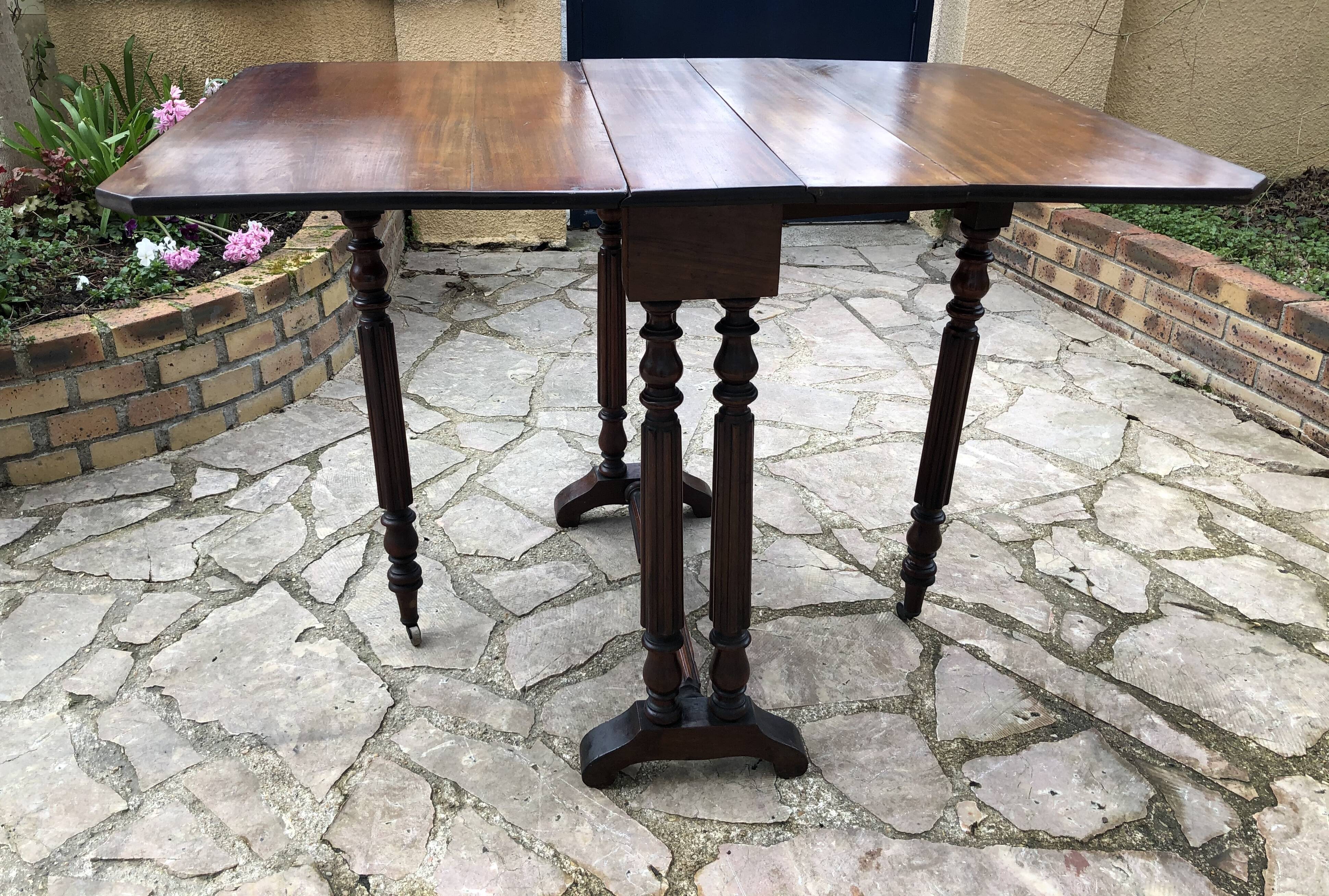 Side table with flaps