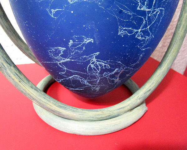 Suspended glass vase