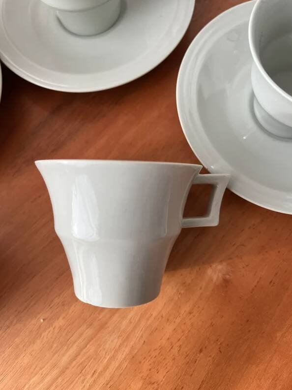 Art Deco cups and saucers by Théodore Haviland in celadon.