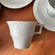 Art Deco cups and saucers by Théodore Haviland in celadon.