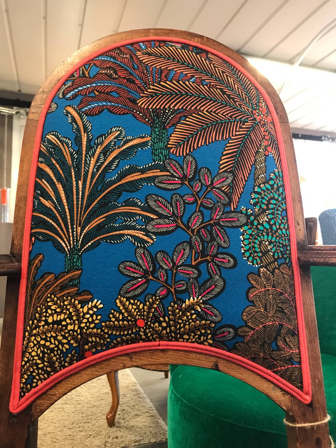 Art Nouveau armchair with a floral seat and backrest.