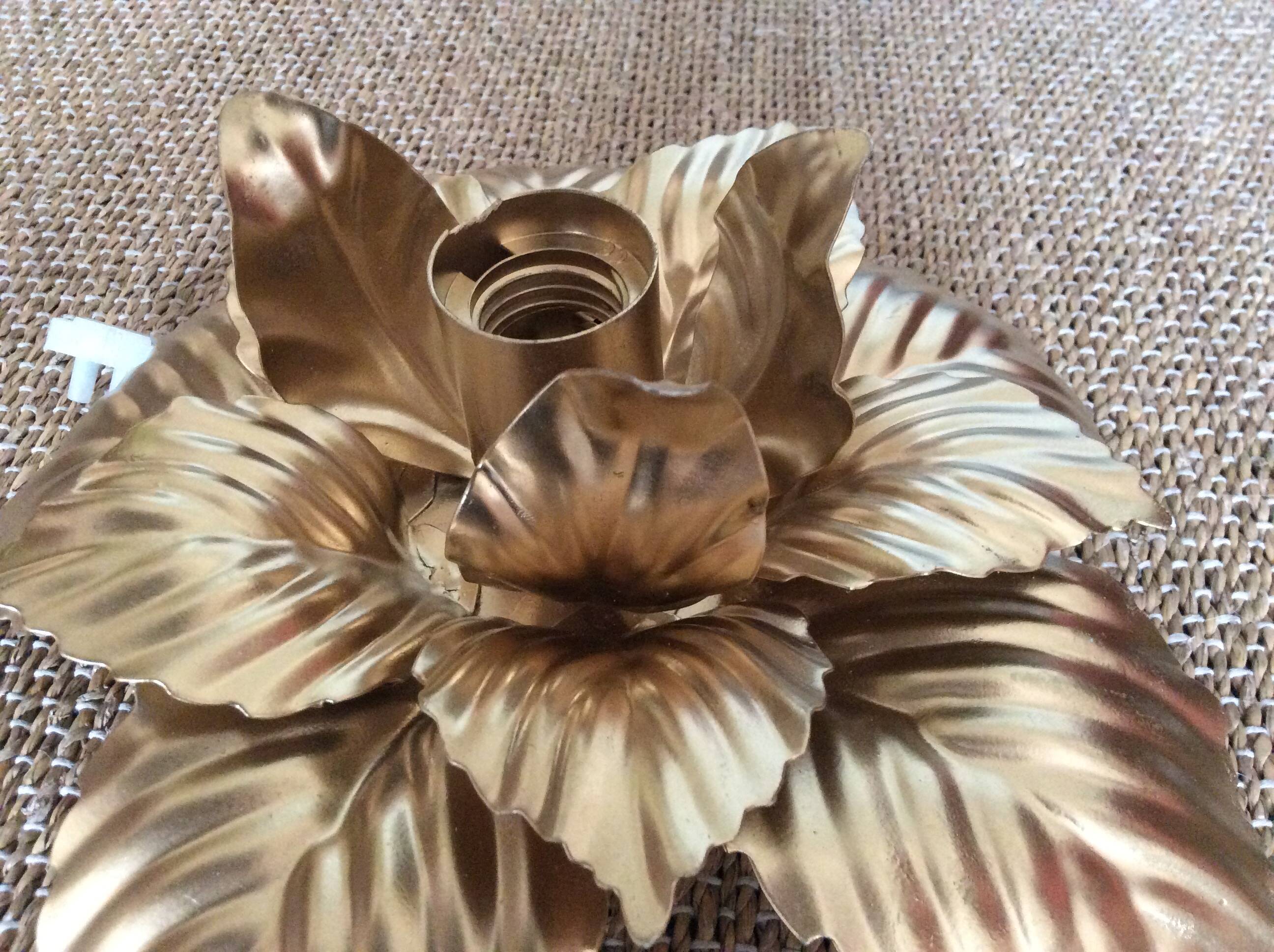 Gold metal flower wall light