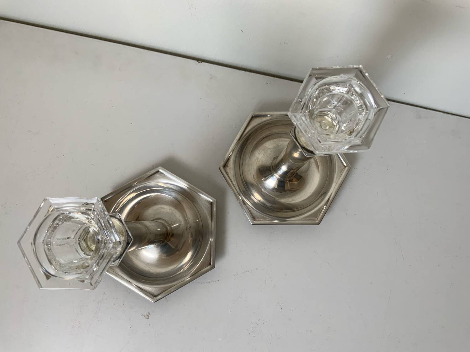 Pair of silver-plated metal candlesticks