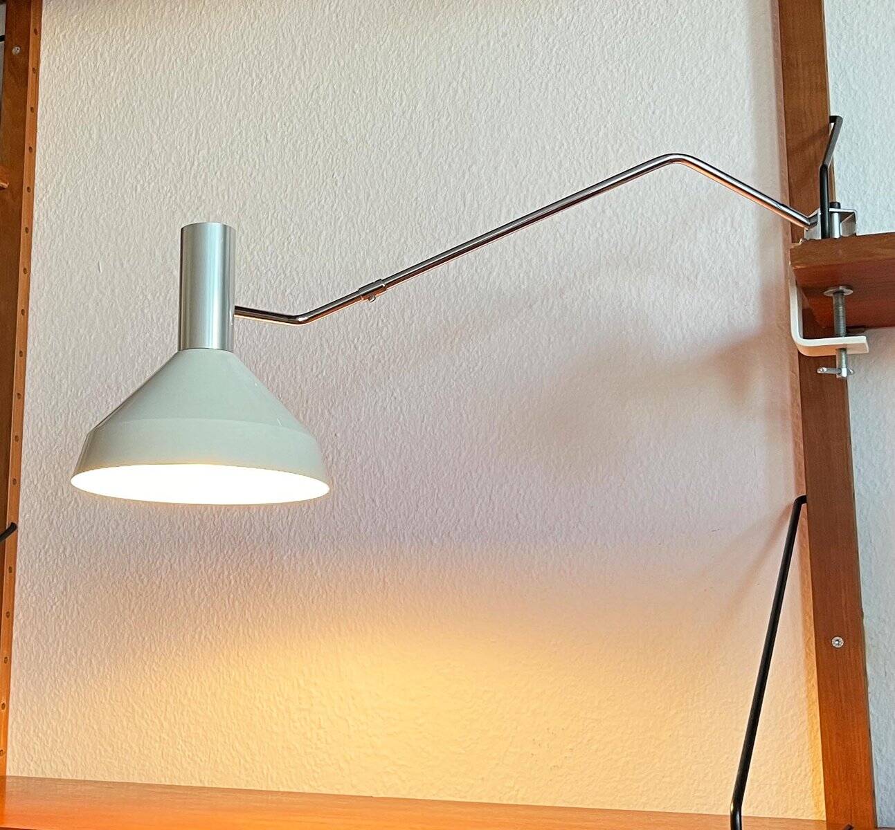 Mid-century minimalist Swiss table lamp with a clamp by Rosemarie and Rico Baltensweiler for Baltensweiler, 1950s.