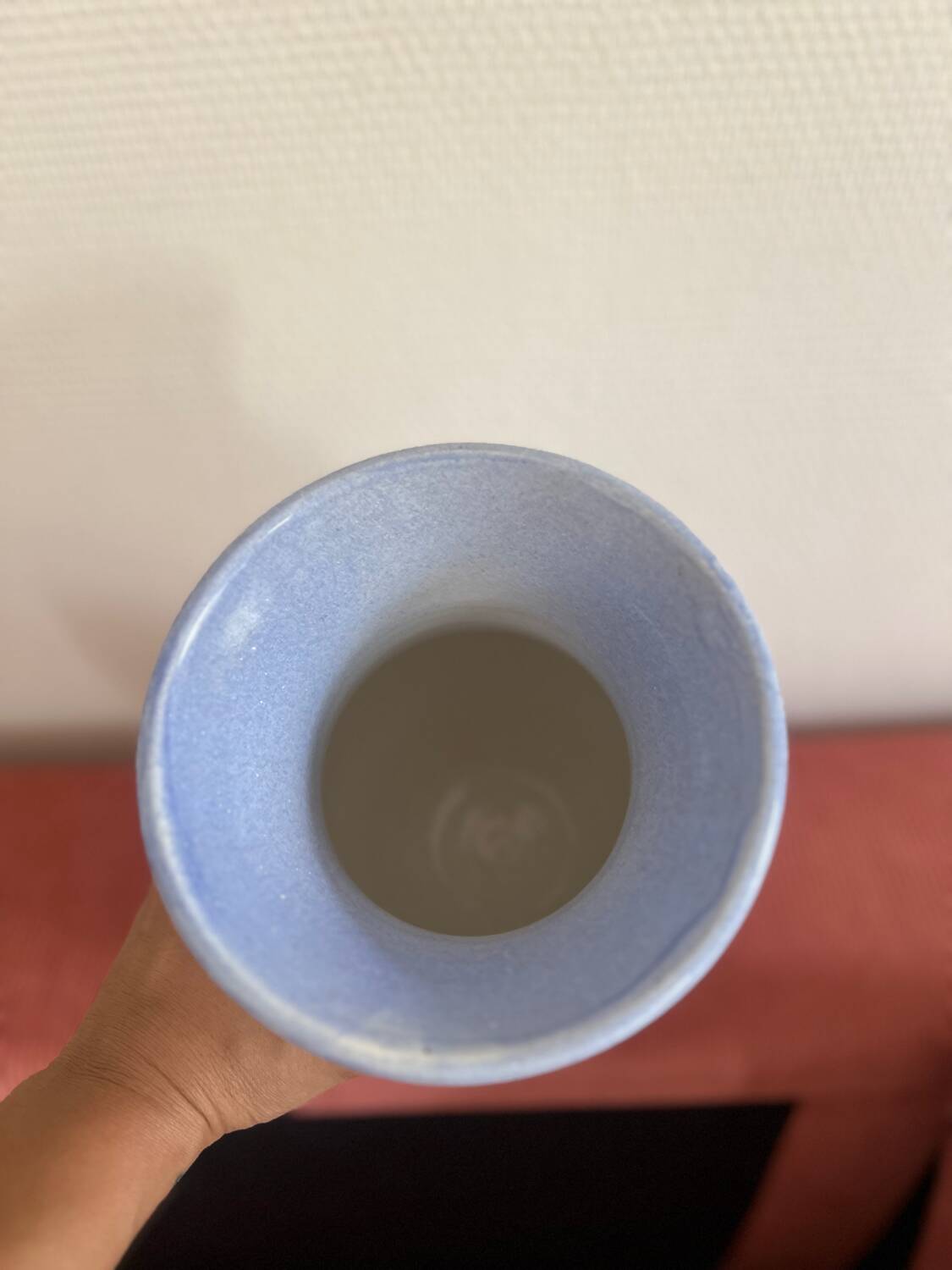 Large blue vase with pastel flowers