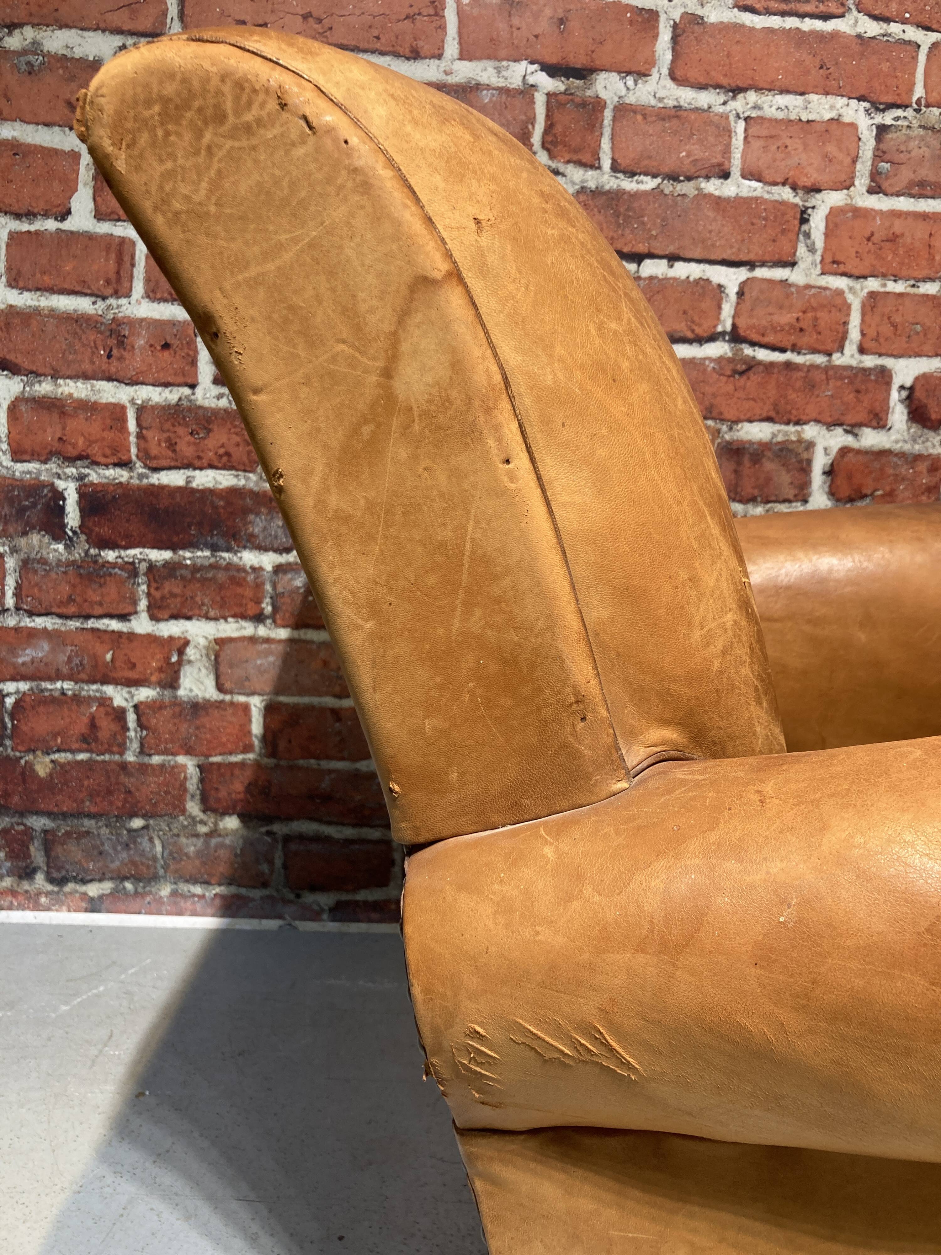 Brown leather armchair