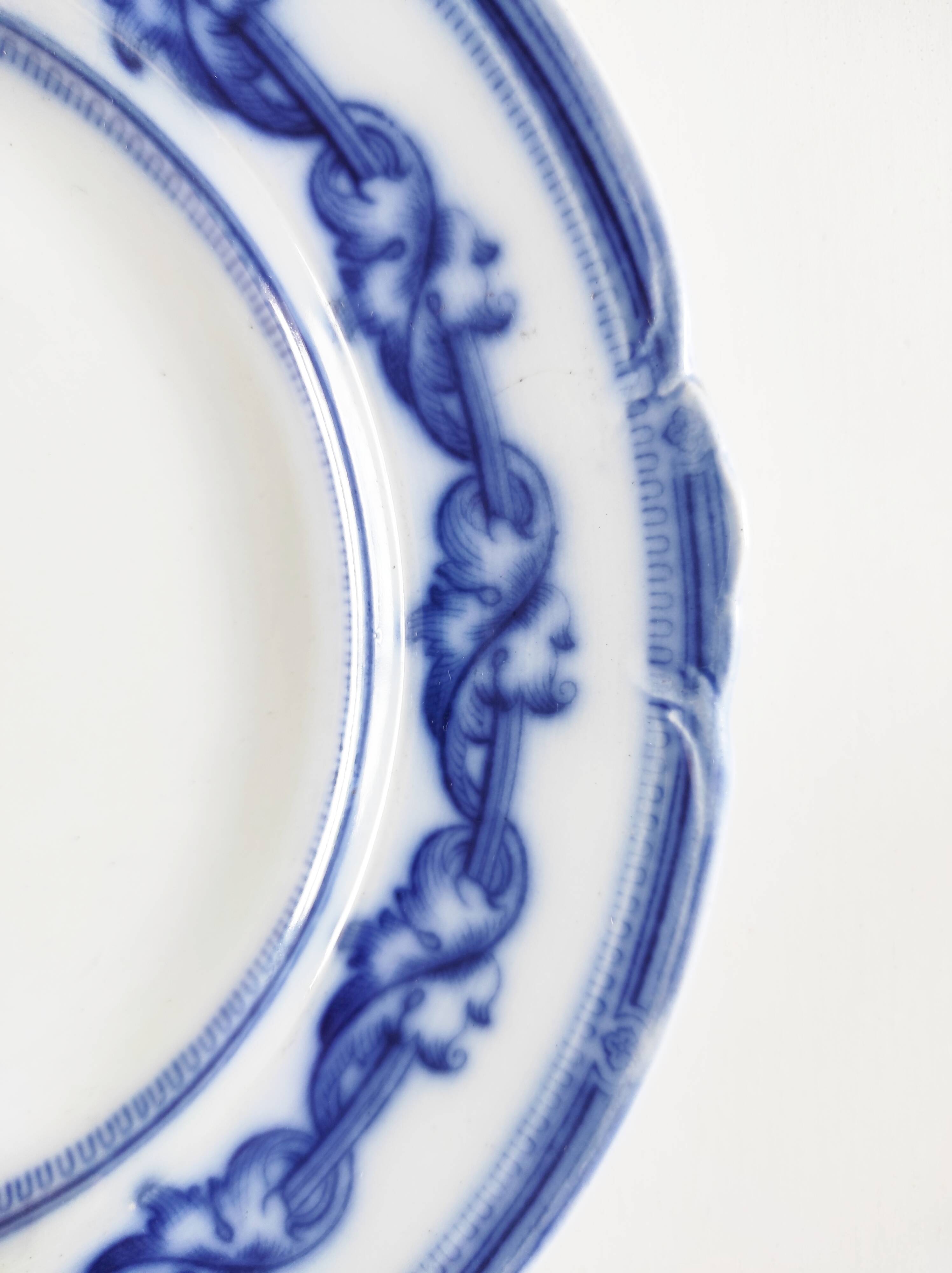 Pair of English earthenware plates, leaf pattern.