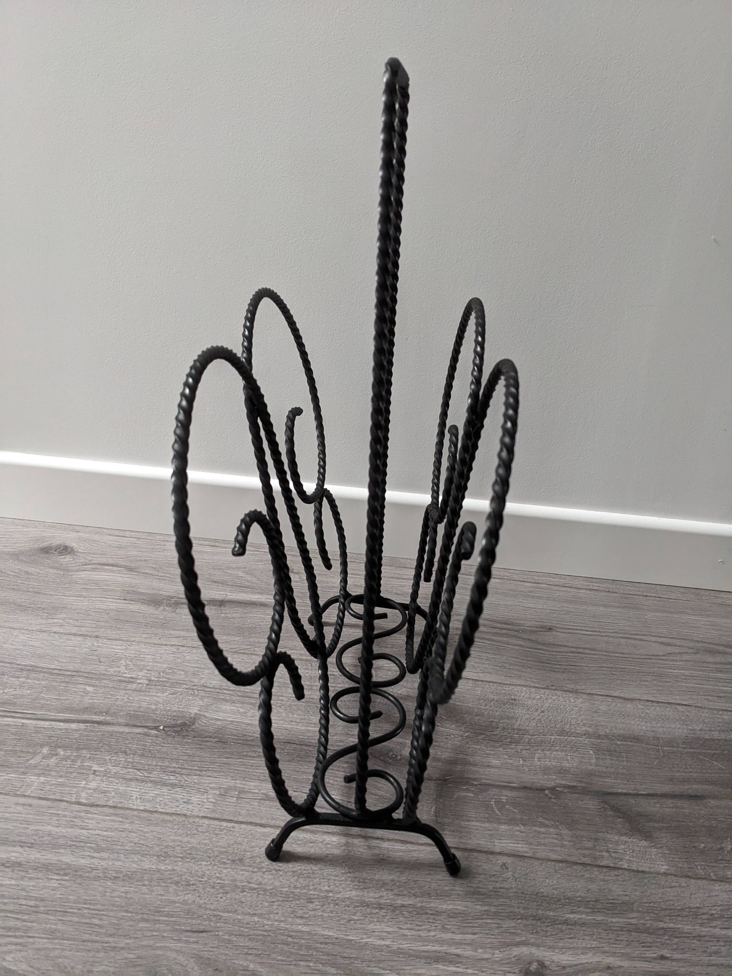 Vintage wrought iron magazine rack