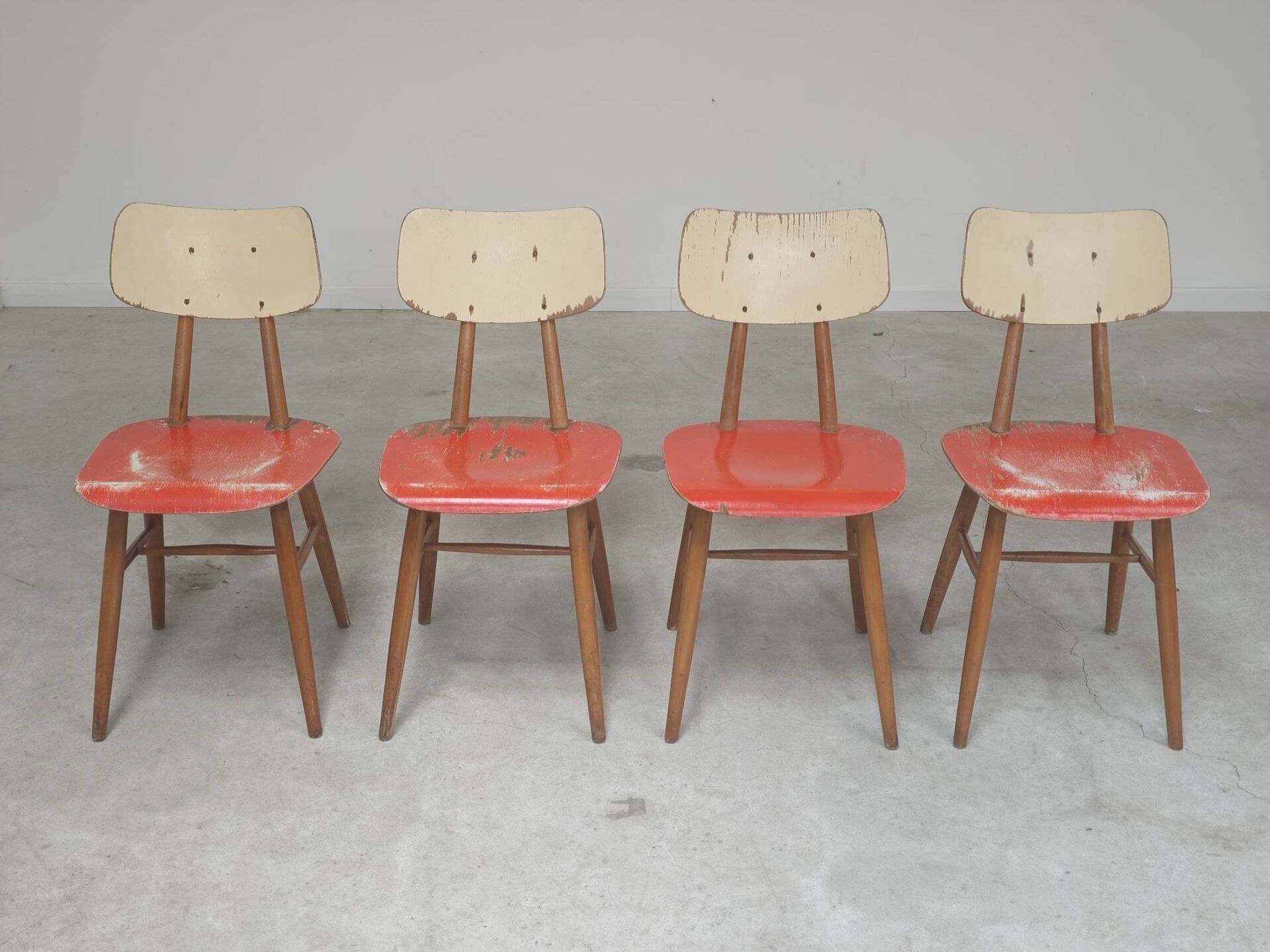 Set of 4 Ton (Thonet) red wooden chairs from the 1960s.