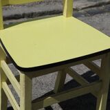 Formica and yellow wood chair