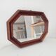 Vintage octagonal mirror from the 1960s.