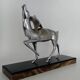 Silvered bronze sculpture signed by Michel Decoux.