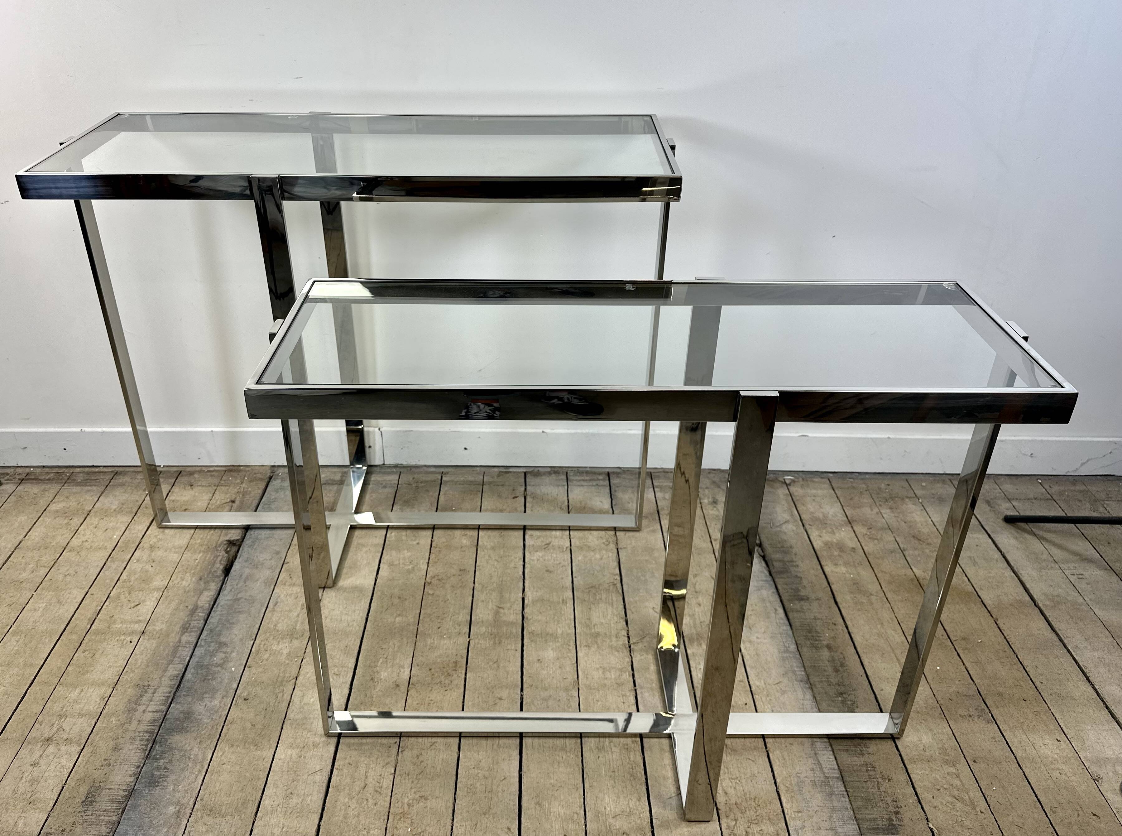 Chrome metal and glass console from the 2000s.