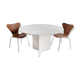 Round dining table in travertine from the 1980s.